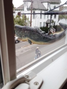 A view out the window at the brewery, including their interesting sign.