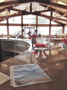 The musician is way down at the far end of the room.