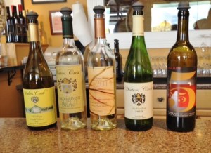 The lineup so far, with the Charles Demuth-inspired label on the far right.