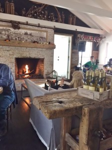 A view of the fireplace plus musicians