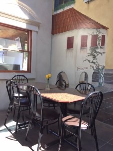 The room feels like a piazza in Tuscany--almost.